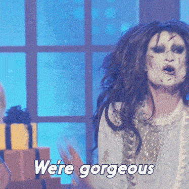 a picture of a woman with the words " we 're gorgeous " on the bottom