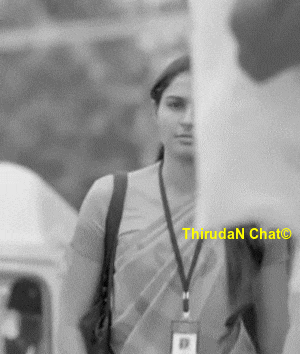 a black and white photo of a woman with a lanyard that says thrudan chat on it