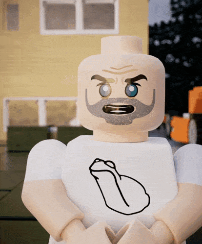 a lego figure with a beard and blue eyes has a drawing of a penis on his shirt