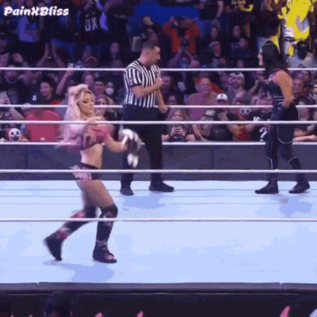 a woman in a wrestling ring with the words paint bliss on the bottom right