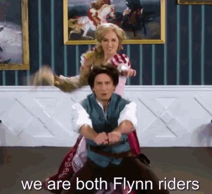 a man is riding a woman on a horse with the words we are both flynn riders