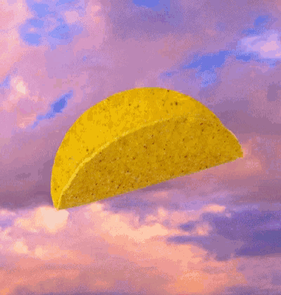 a taco with gummy worms on top of it