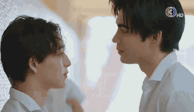 two men are looking at each other with the number 3 on the bottom right corner