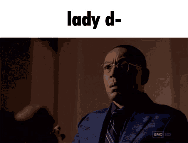 a man in a suit and tie with the words lady d- written above him