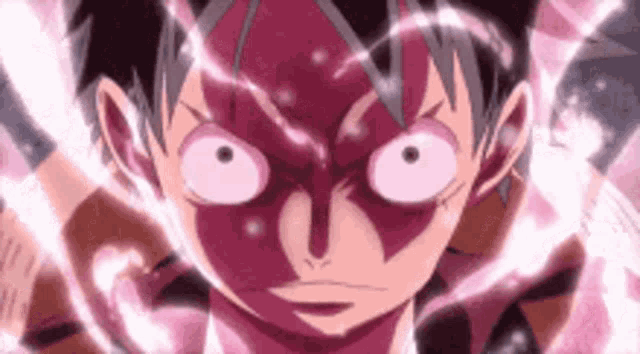 a close up of a person 's face with glowing eyes and a pink face paint .