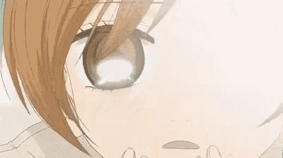 a close up of a person covering their face with their hands and the words mi destino fuera estar contigo