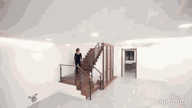 a woman is walking up a set of stairs made in animatica