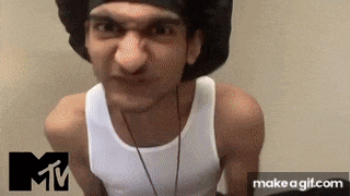 a man is wearing a white tank top and a black hat .