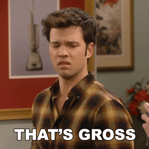 a man in a plaid shirt says " that 's gross " in front of a picture of a vacuum cleaner