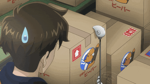 a man is looking at a cardboard box that says beaver
