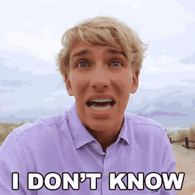 a man in a purple shirt says i don t know
