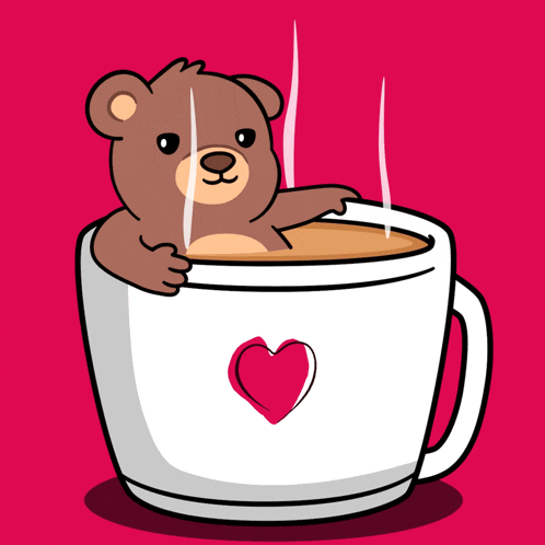 a teddy bear is sitting inside of a cup of coffee