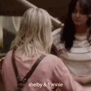 shelby and frannie are sitting next to each other in a room