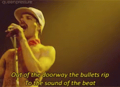 Queen Freddie Mercury GIF - Queen Freddie Mercury Out Of The Doorway The Bullets Rip GIFs