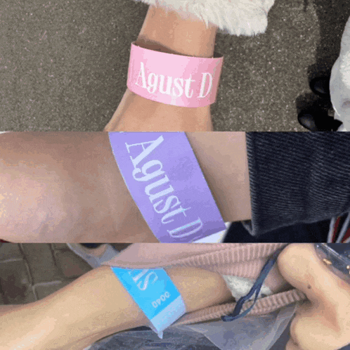 a person wearing a pink and purple wristband that says agust d.