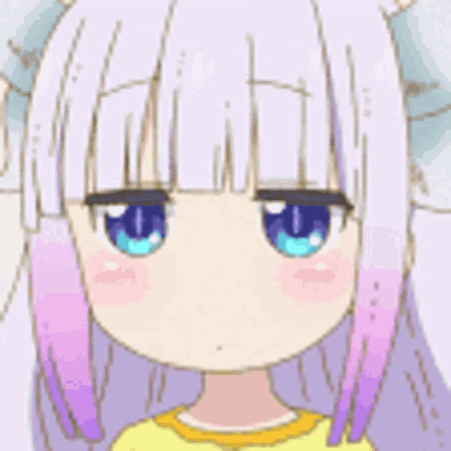 a close up of a cartoon girl 's face with a yellow shirt on .