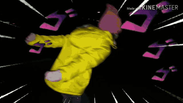 a person in a yellow jacket and pink hat is dancing in the dark