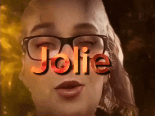 a woman wearing glasses has the word jolie written on her face