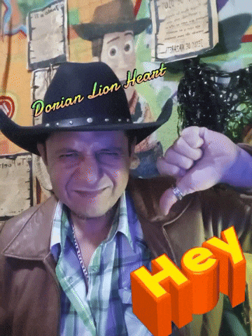 a man wearing a cowboy hat has the name dorian lion heart on his hat