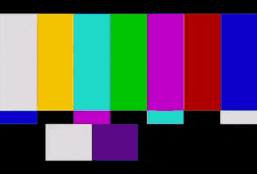 a television screen with a rainbow of colors on it