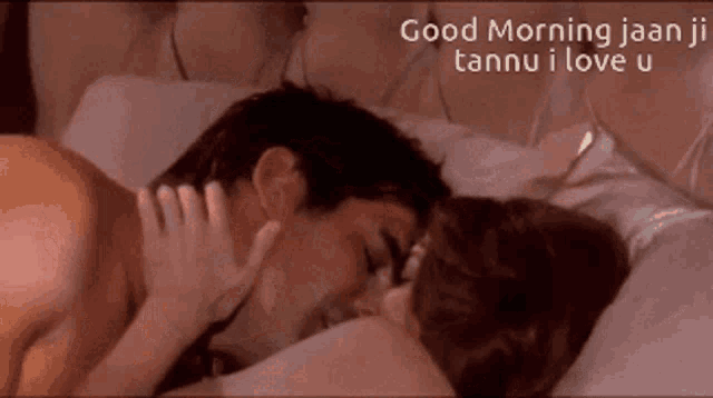 a man and woman kissing in bed with the words good morning jaan ji tannu i love u on the bottom