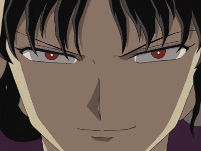 a close up of a cartoon character 's face with red eyes