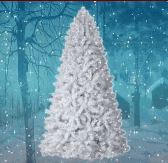 a white christmas tree is surrounded by snow and trees