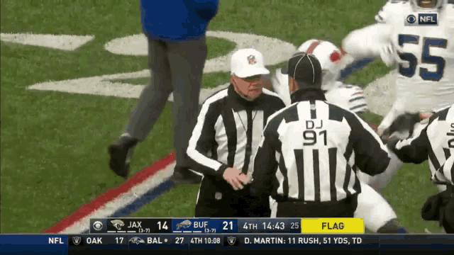 a referee with the number 91 on the back of his jersey