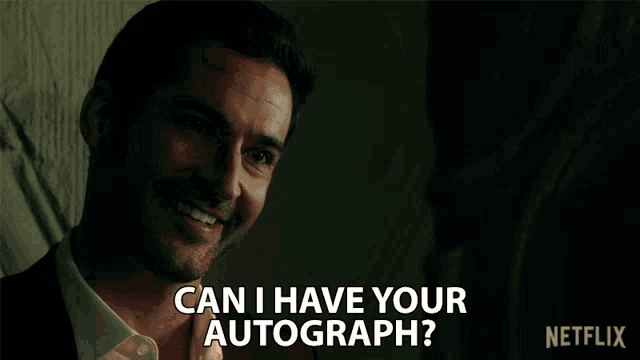 a man is asking if he can have an autograph