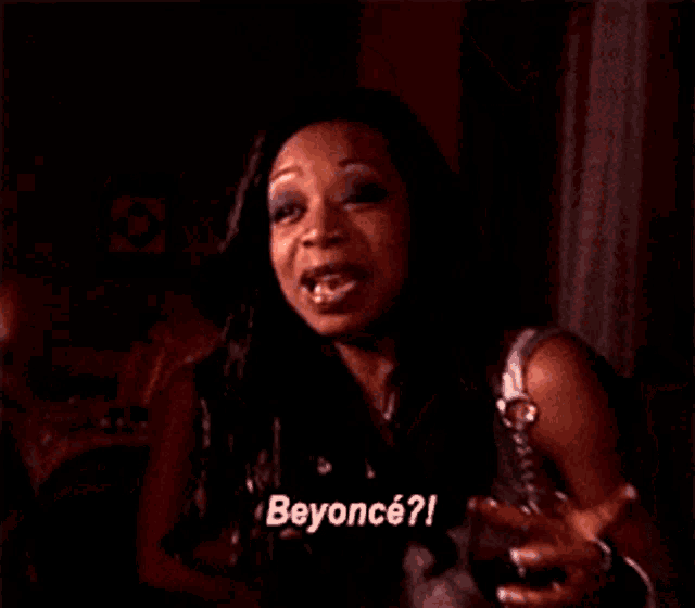 a close up of a woman 's face with the words beyonce written on it