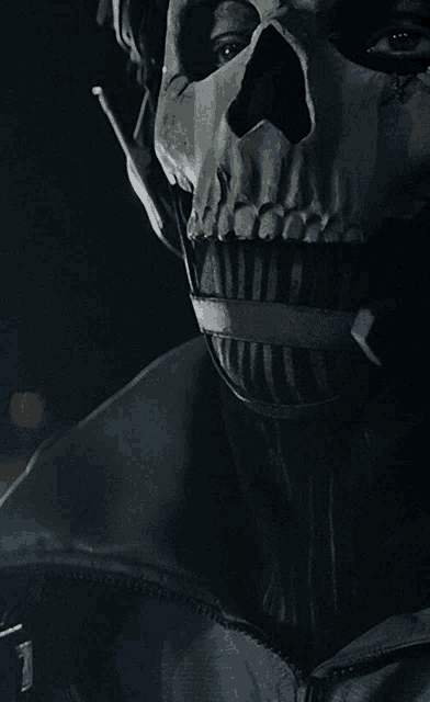 a person with a skull on their face with the number 1 on their jacket