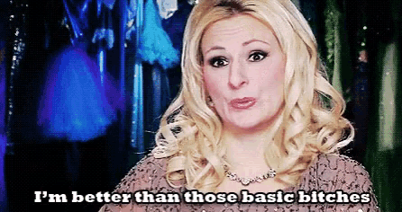 a blonde woman is saying i 'm better than those basic bitches .