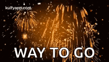 a fireworks display with the words `` way to go '' in front of it