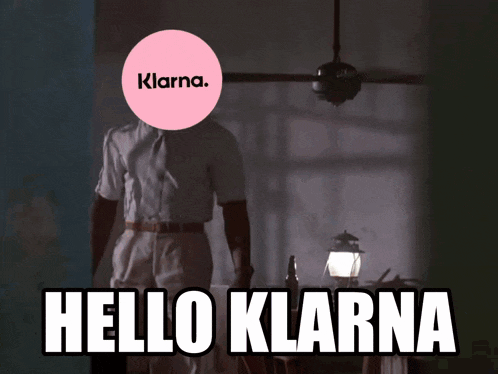 a man with a klarna logo on his head