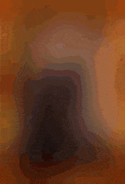 a picture of a woman in a black dress sitting in a chair with flames around her