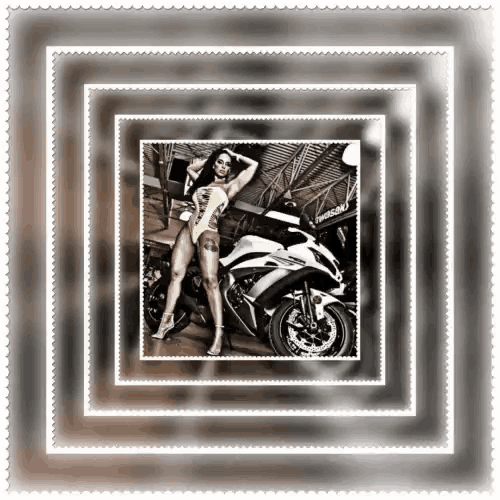 a woman is standing next to a motorcycle that says kawasaki on the front