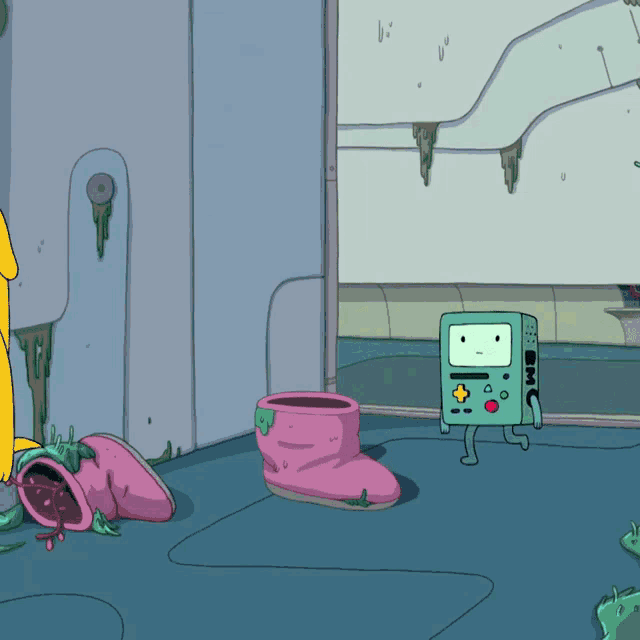 a cartoon character with a box that says bmo