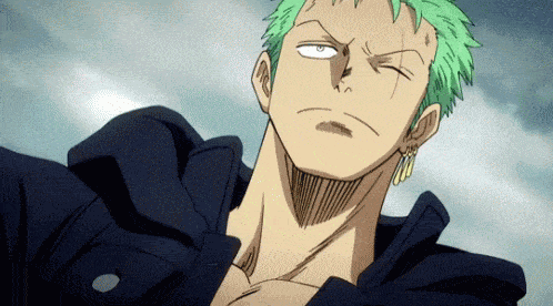 a close up of a man with green hair wearing a black jacket .