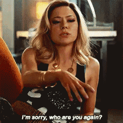 a woman says i 'm sorry who are you again while sitting down