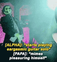a man with a mask on his face is playing a guitar solo .