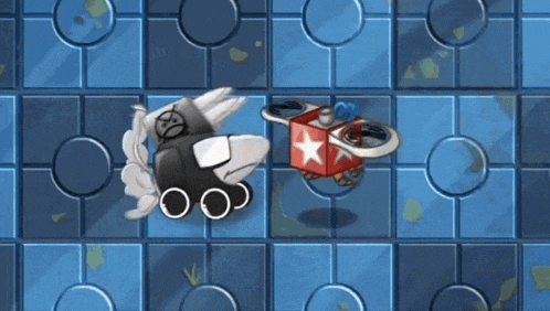 a red box with a star on it is on a blue tile floor