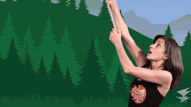a woman in a black tank top that says rocker giant