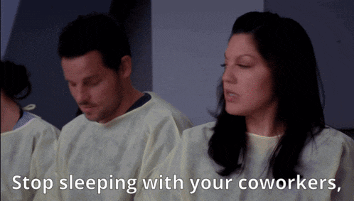 a man and a woman sitting next to each other with the words " stop sleeping with your coworkers "