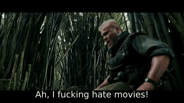 a man screaming in the woods with the words ah i fucking hate movies