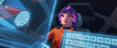 a girl with purple hair is sitting in front of a computer screen