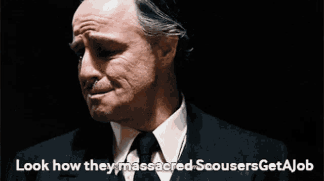 a man in a suit and tie says look how they massacred scousers getajob