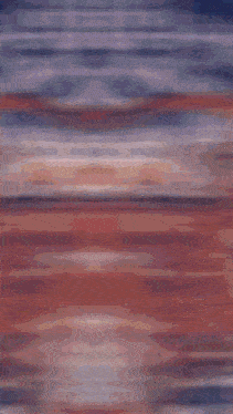 a close up of a blanket with a red s on it