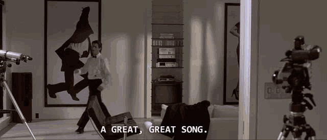 a man in a tuxedo is dancing in a room with the words a great great song