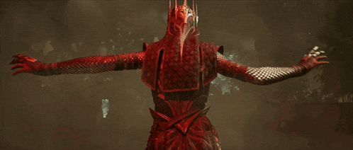 a person with a crown on their head is wearing a red outfit