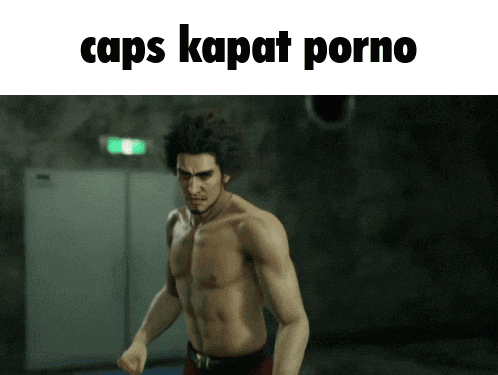 a shirtless man is standing in a dark room with the words caps kapat porno written above him